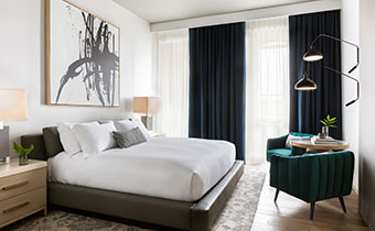 The Kimpton Pittman Hotel guestroom king bed