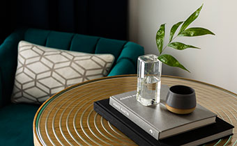 The Kimpton Pittman Hotel table books and decor