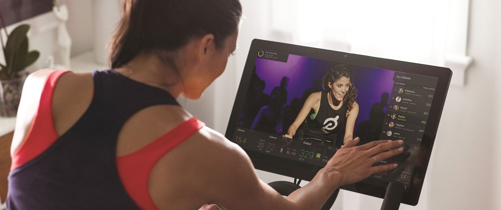 woman on Peloton bike